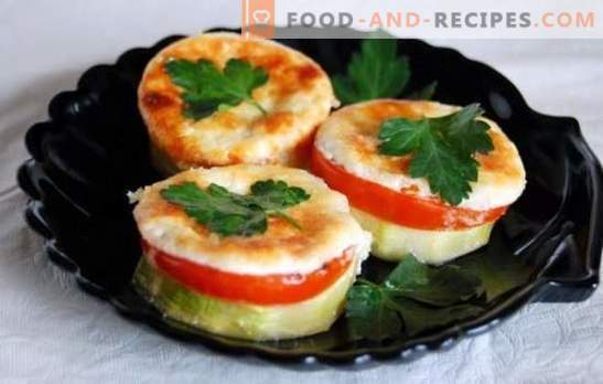 Zucchini mit Tomaten und Käse, im Ofen gebacken: saftig mit herrlicher Kruste. Originalrezepte für Zucchini mit Tomaten und Käse, im Ofen gebacken