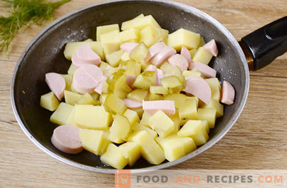 Gekochte Kartoffeln mit einem Ei in einer Pfanne - ein nahrhaftes Gericht von 
