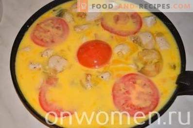 Omelett mit Hähnchen und Tomaten im Ofen