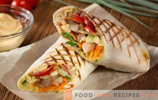 Schweinefleisch-Shawarma - königliches Fast Food! Rezepte hausgemachtes Shawarma mit Schweinefleisch und Gemüse, Pilzen, Käse, Gurken