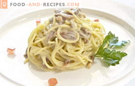 Spaghetti in a creamy sauce with chicken, pork and fish. Fast and festive spaghetti dishes in cream sauce